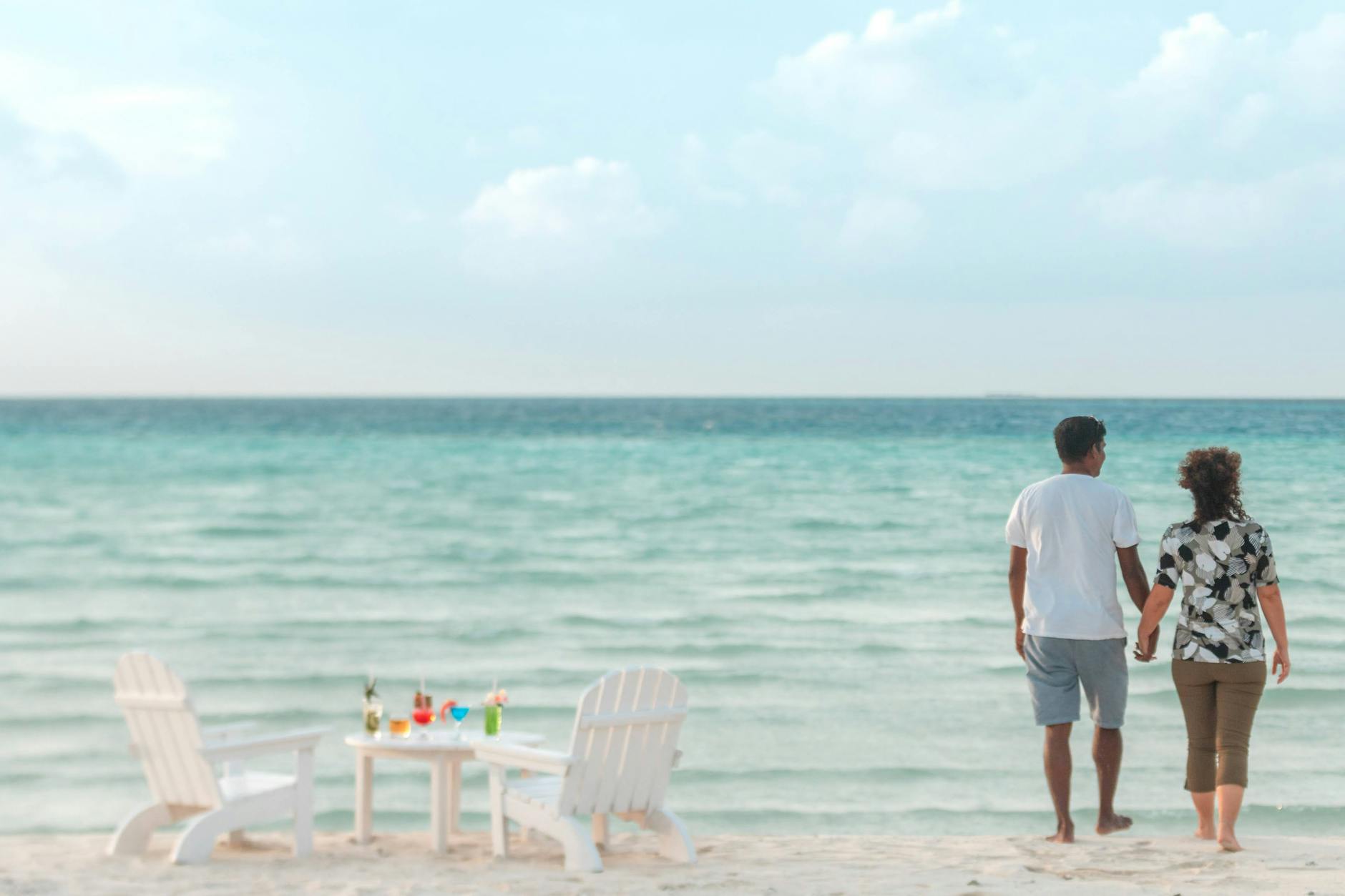 romantic beach stroll in maldives