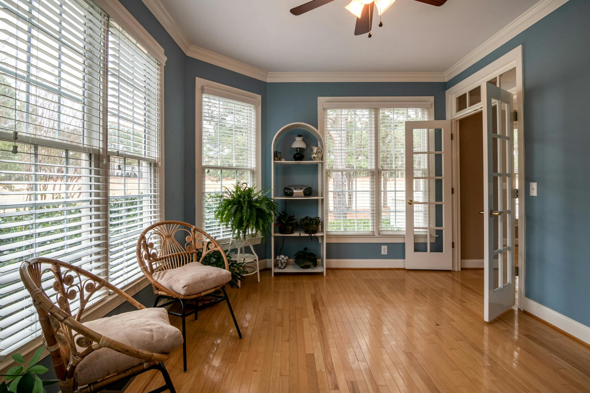 photo of wooden chair near window