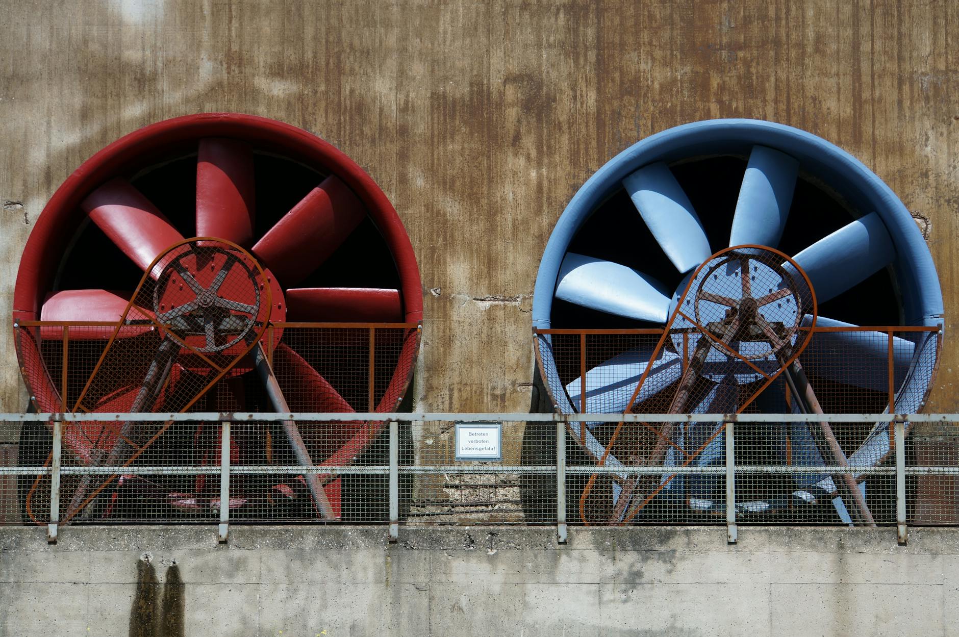 red and blue industrial exhaust fans