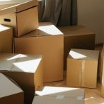 brown cardboard boxes on white ceramic tiles