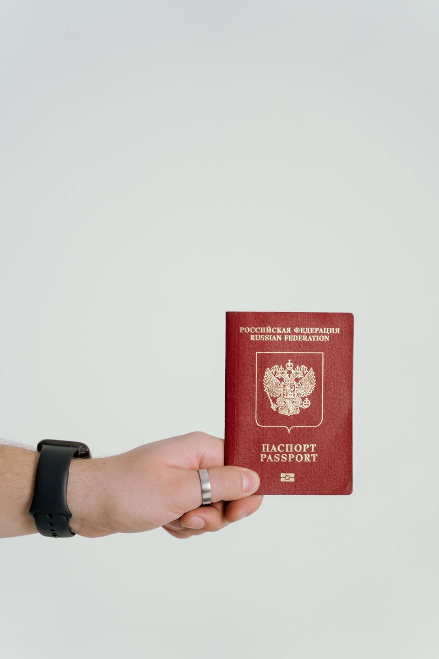 a person holding a passport