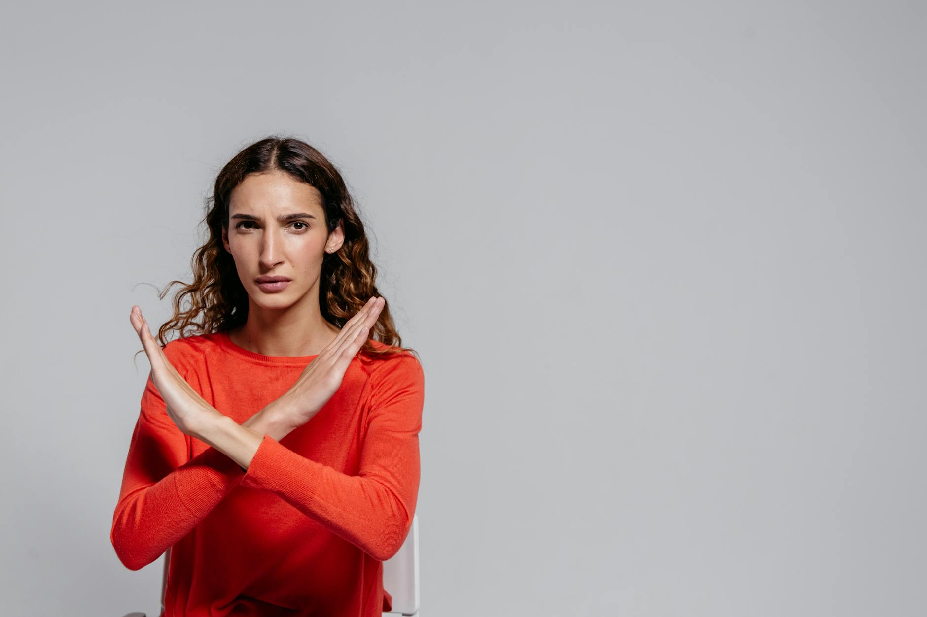 woman in red long sleeve shirt