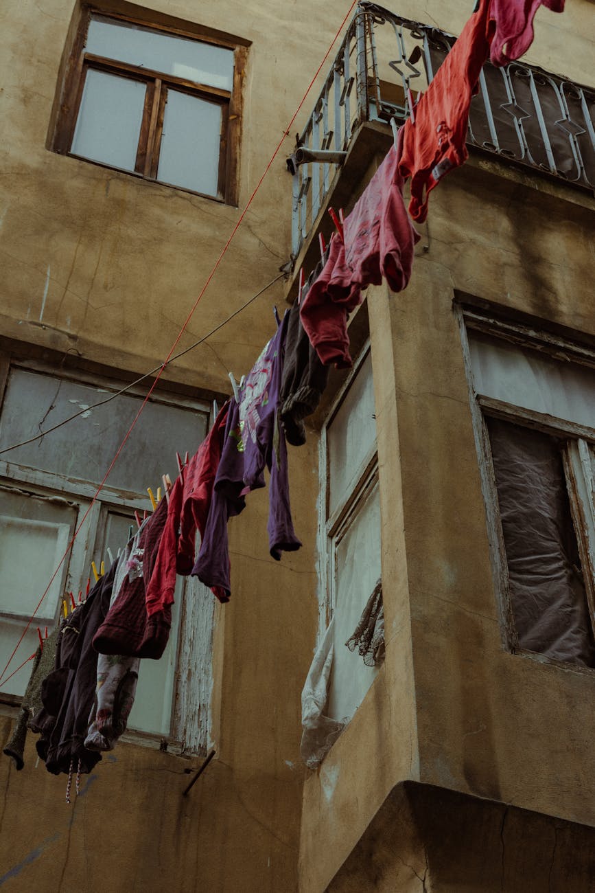 low angle shot of clothesline with hanging fabric