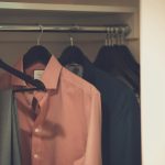 close up photo of hang clothes in wardrobe