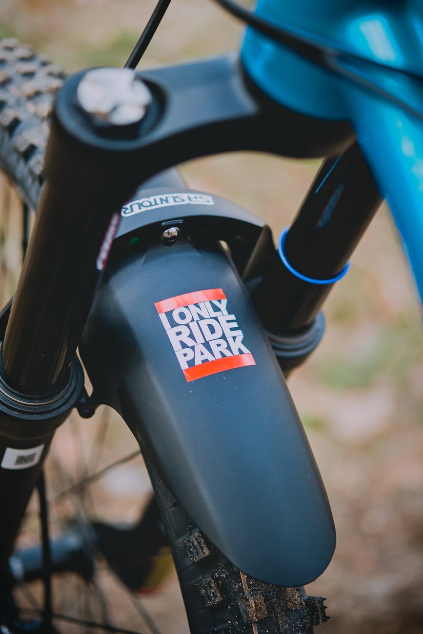 a sticker on the mud guard of a bicycle