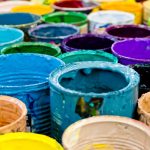 assorted color paint buckets