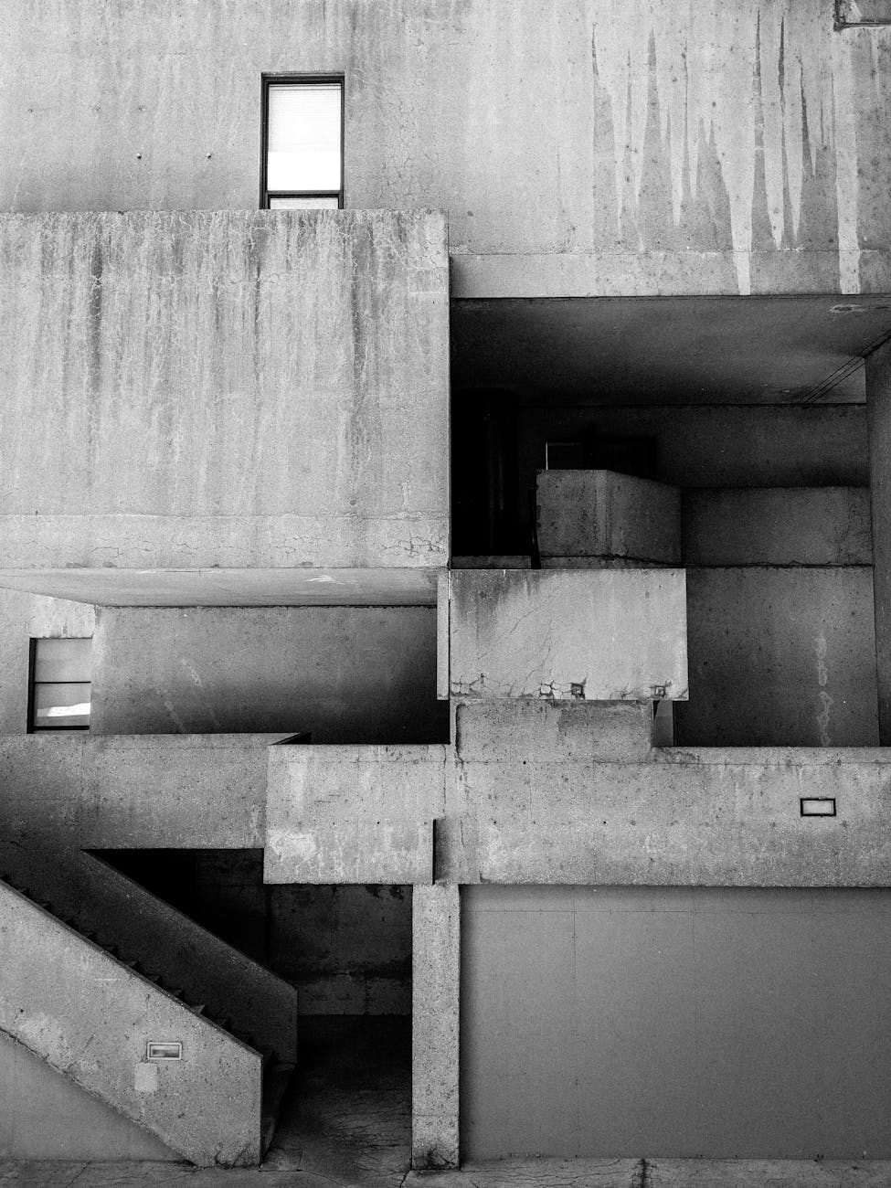 grayscale photo of concrete wall