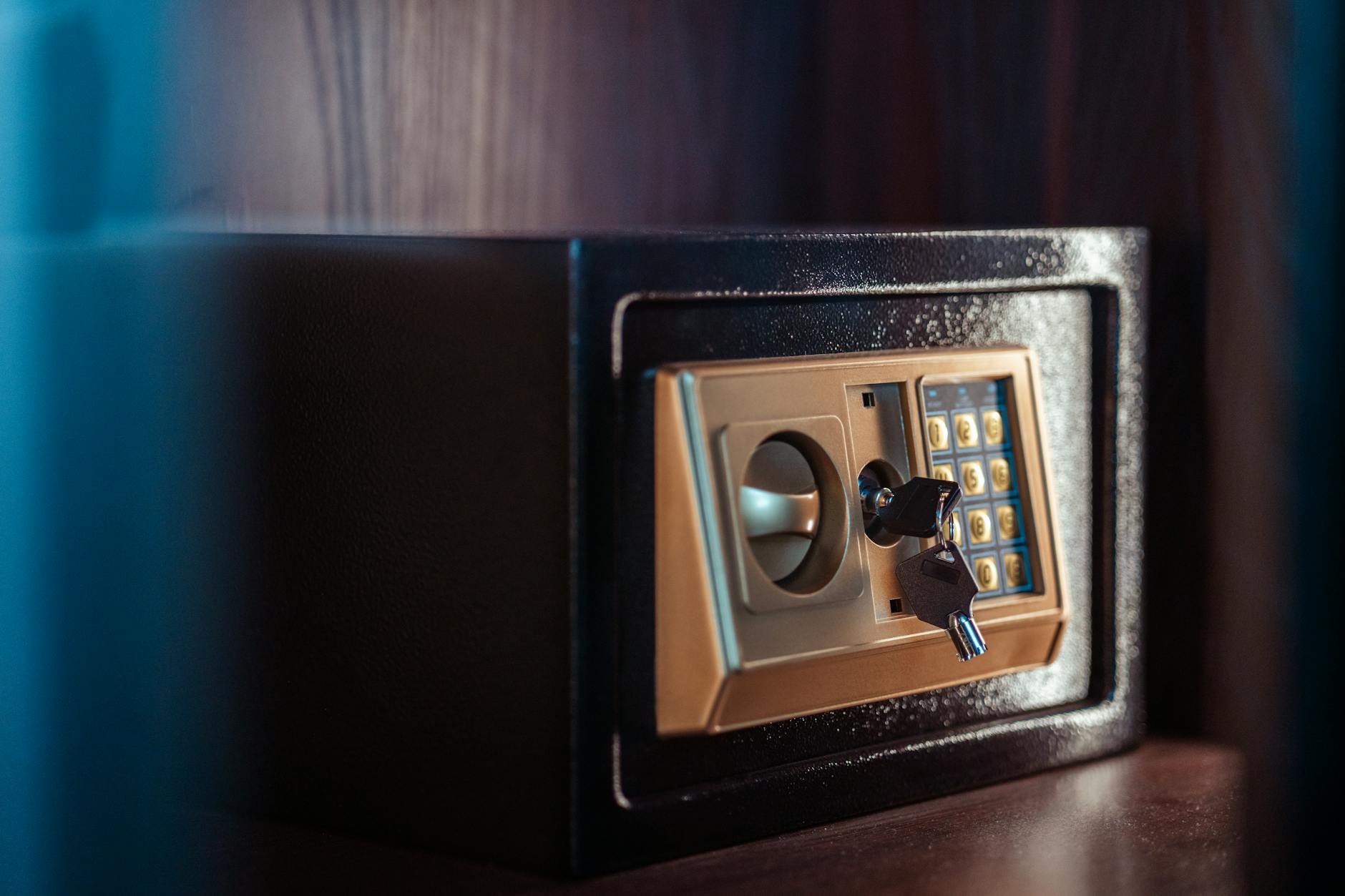 secure electronic safe with key and keypad