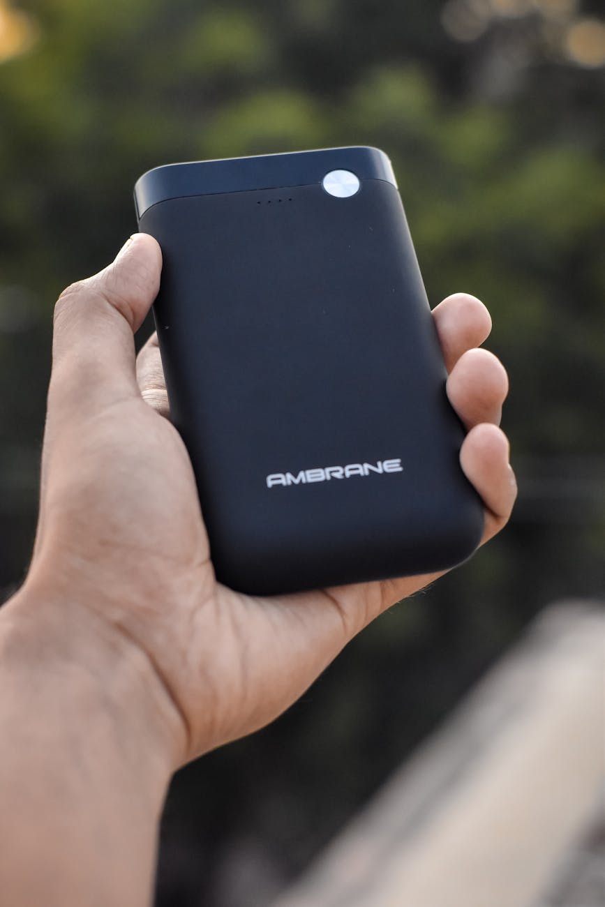 a black power bank on hand